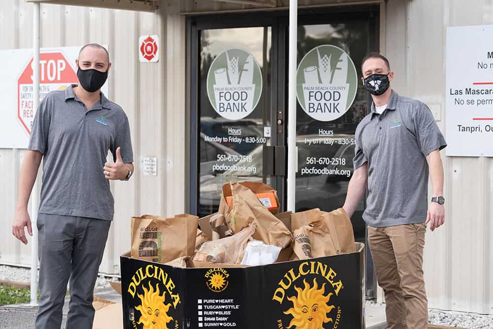 Staff donating palm beach county food bank